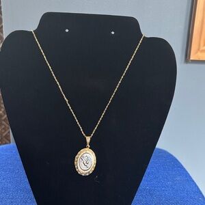Elegant Gold and Silver Pendant Necklace